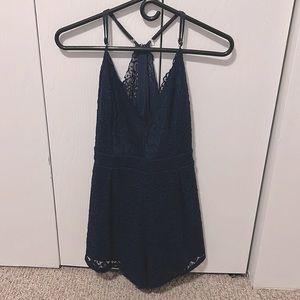 Navy blue, lace romper from Windsor. It’s a large but runs small.